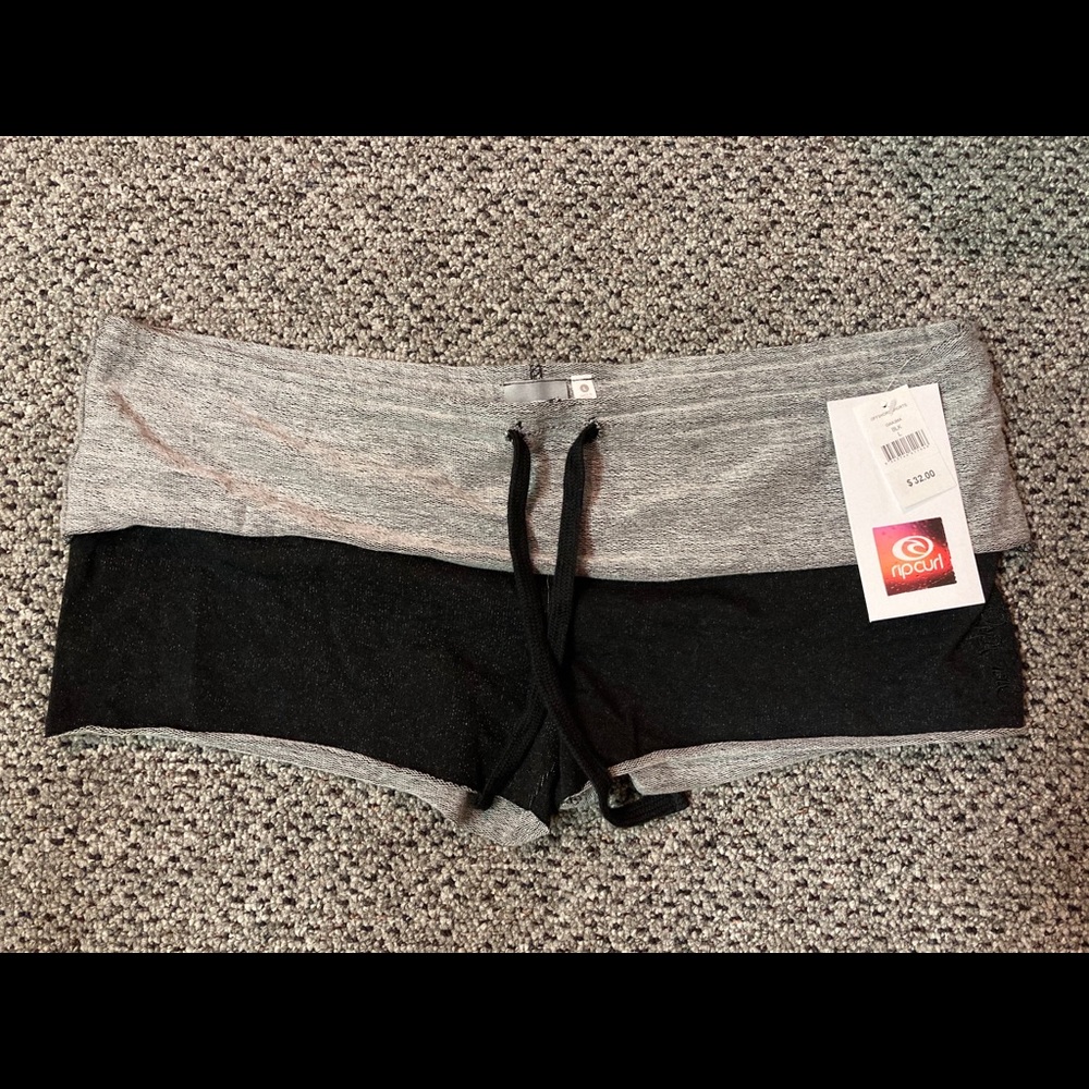 Rip curl shorts. Black, Large, Never used, Tags on